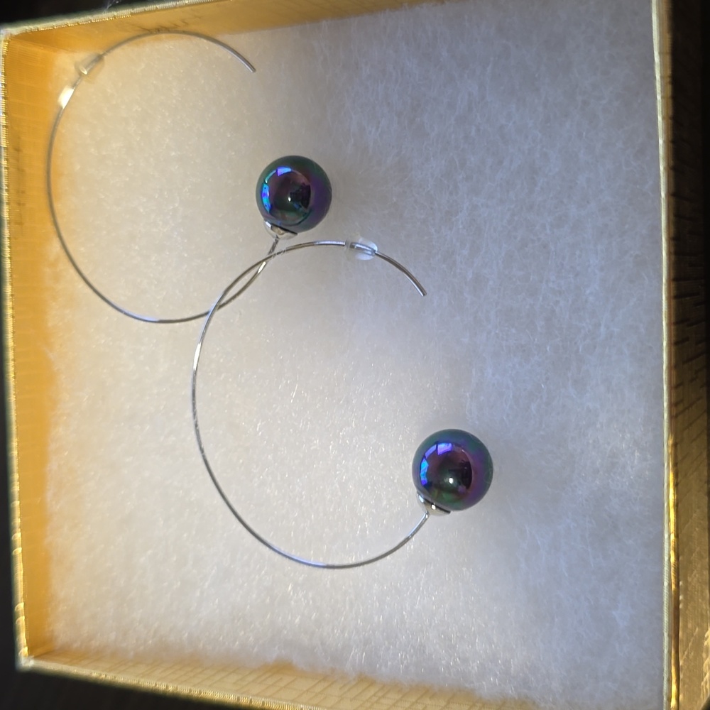 Unique blue pear stainless steel earrings.